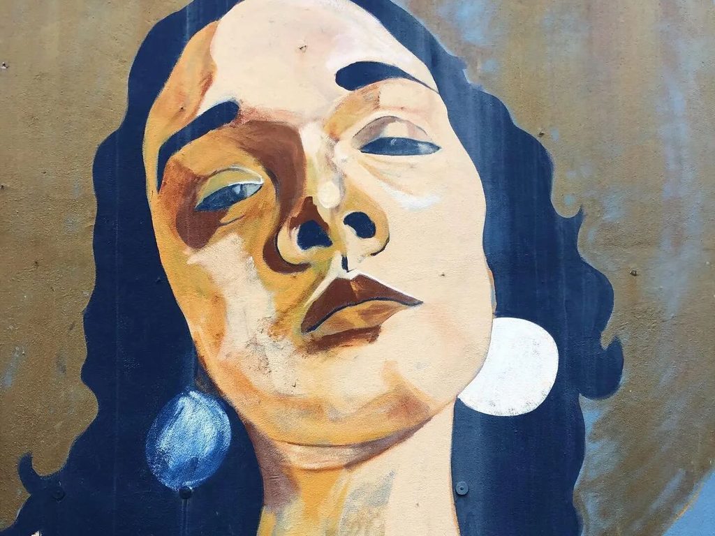 The mural El Basta by artist Soy Baco on a wall in El Poblado de Boquerón